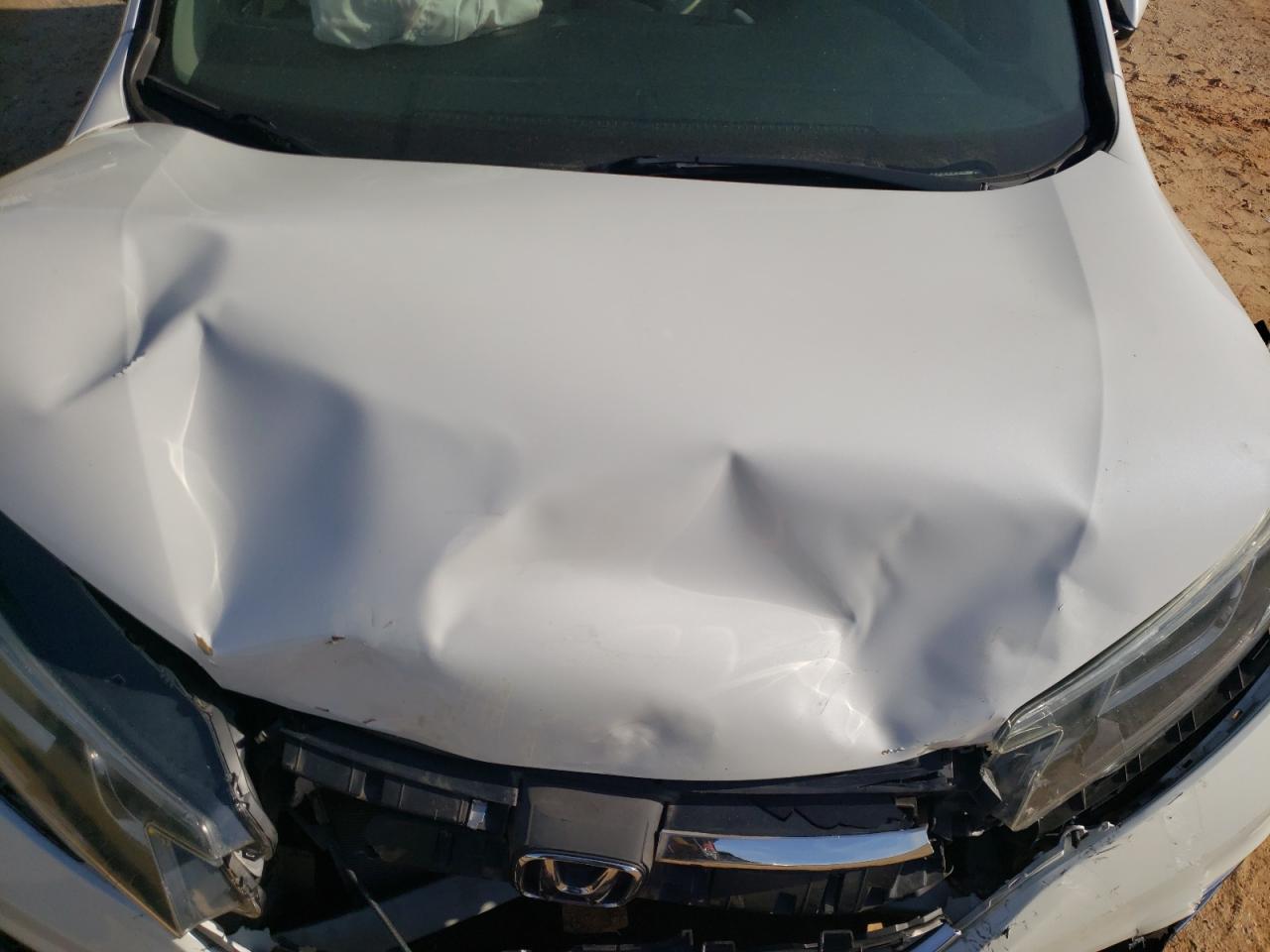 Photo 7 from auction – 2016 HONDA CR-V EXL with VIN 5J6RM3H74GL018910
