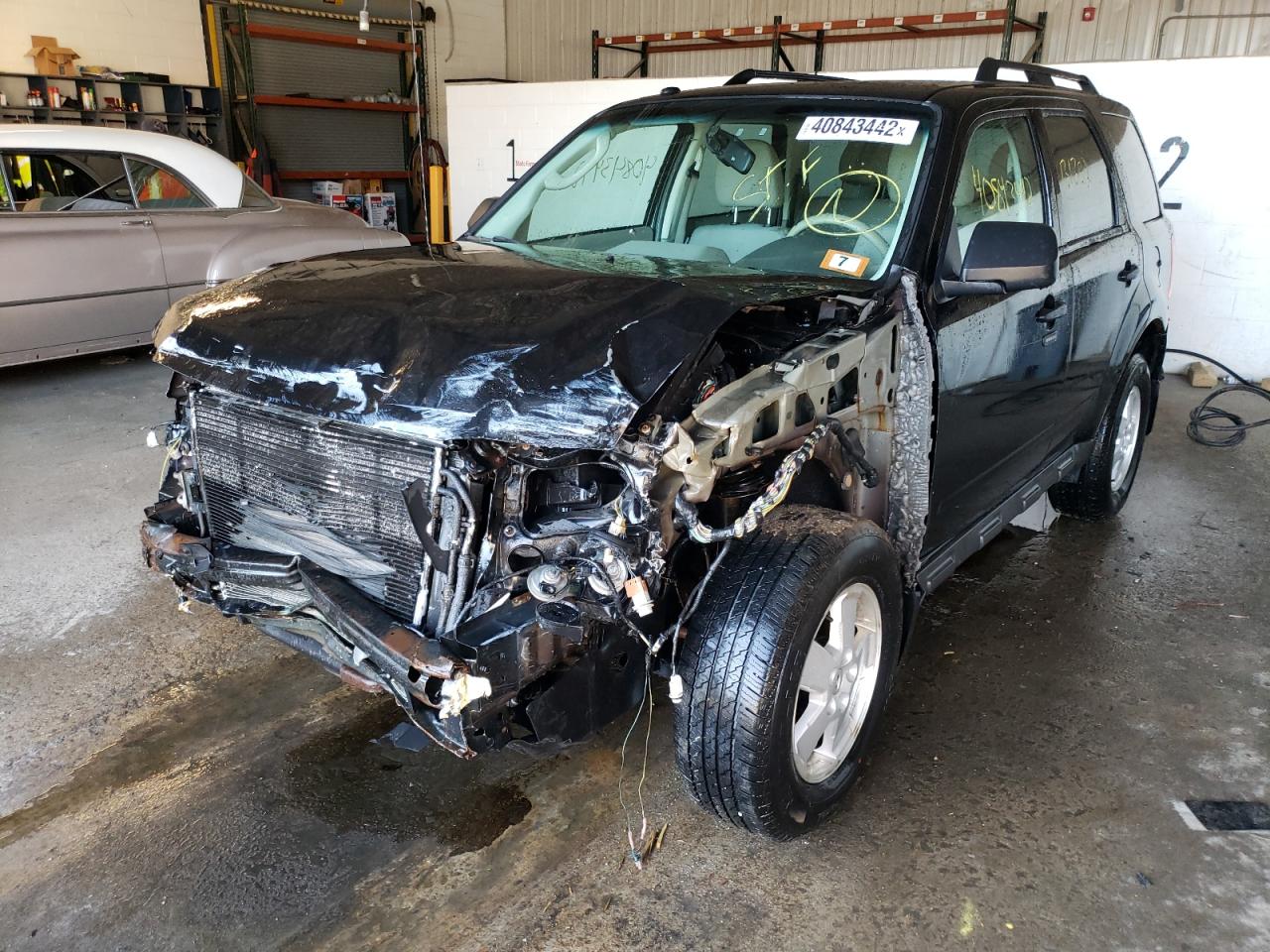 Photo 2 from auction – 2011 FORD ESCAPE XLT with VIN 1FMCU0D77BKC07948
