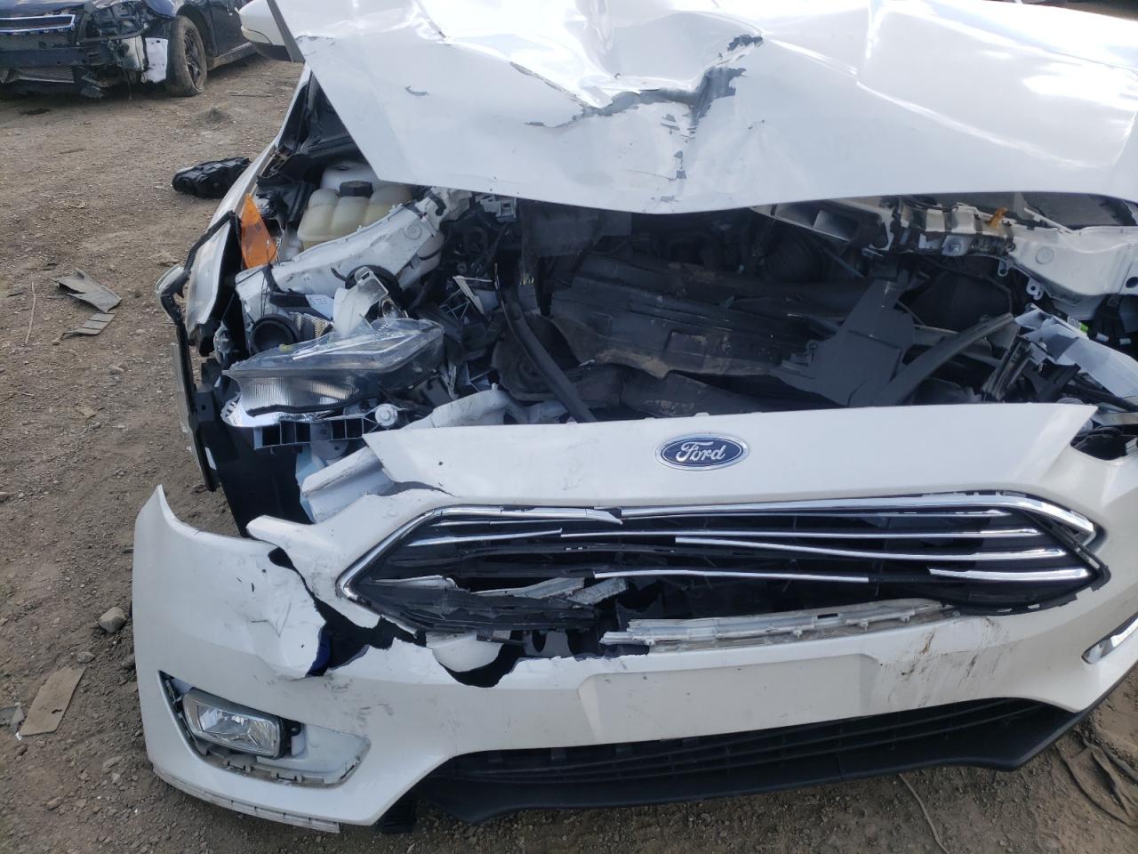 Photo 9 from auction – 2016 FORD FOCUS TITA with VIN 1FADP3J23GL358917