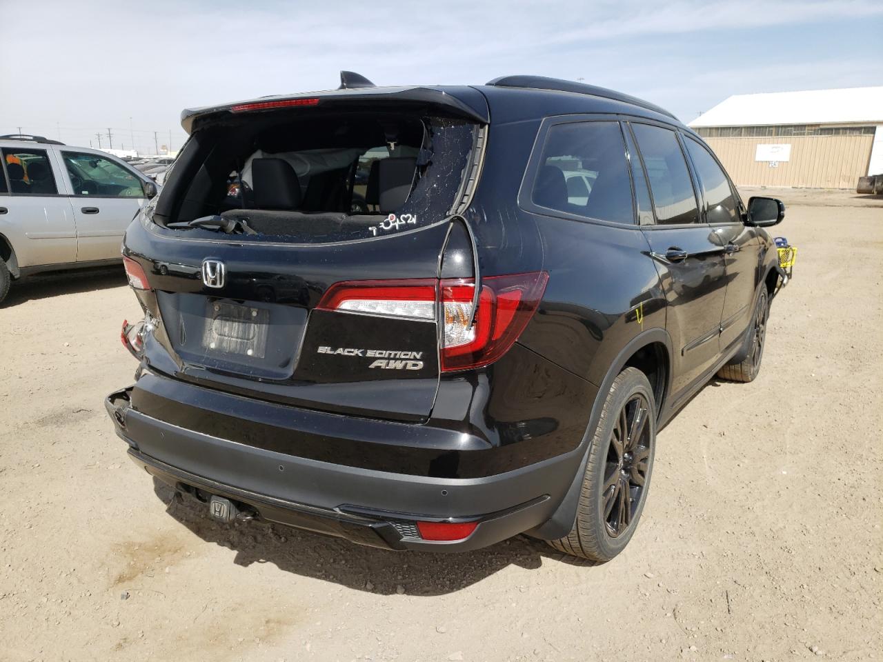 Photo 4 from auction – 2020 HONDA PILOT BLAC with VIN 5FNYF6H70LB013830