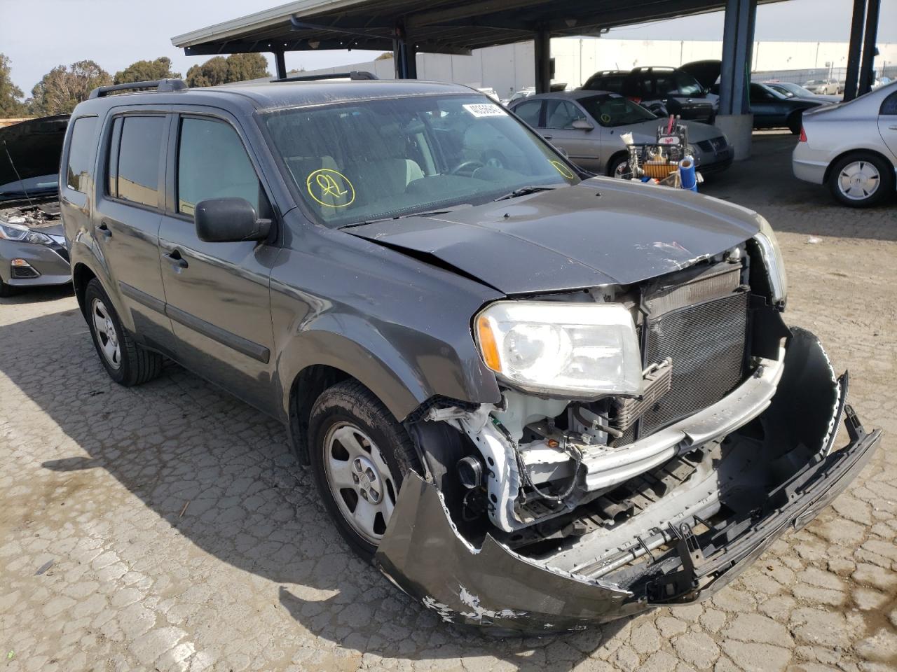 HONDA PILOT LX 2013 with VIN 5FNYF4H29DB074894 - Photo from auction