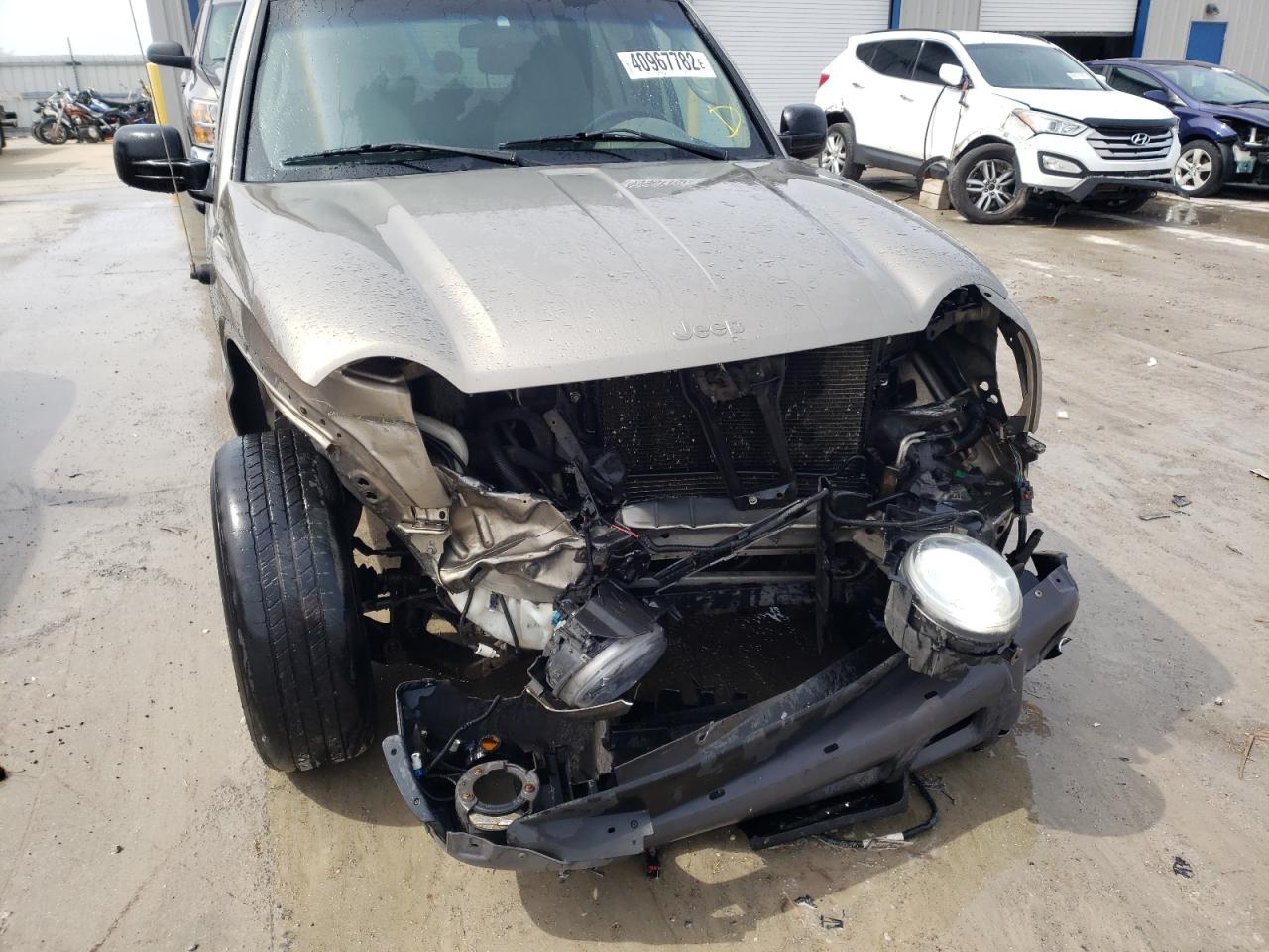 Photo 9 from auction – 2003 JEEP LIBERTY SP with VIN 1J4GL48K33W618492