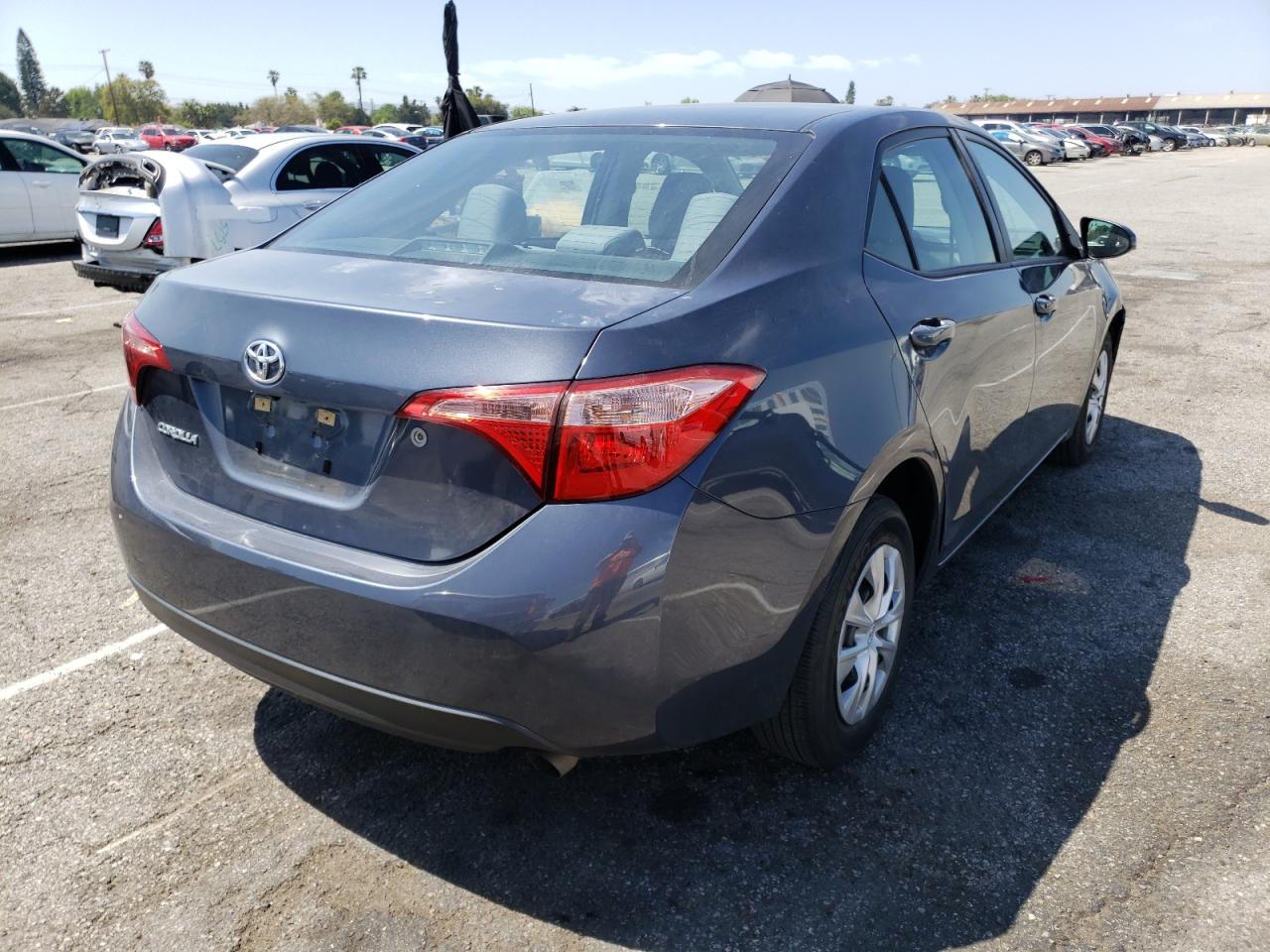 Photo 4 from auction – 2017 TOYOTA COROLLA L with VIN 5YFBURHEXHP696384
