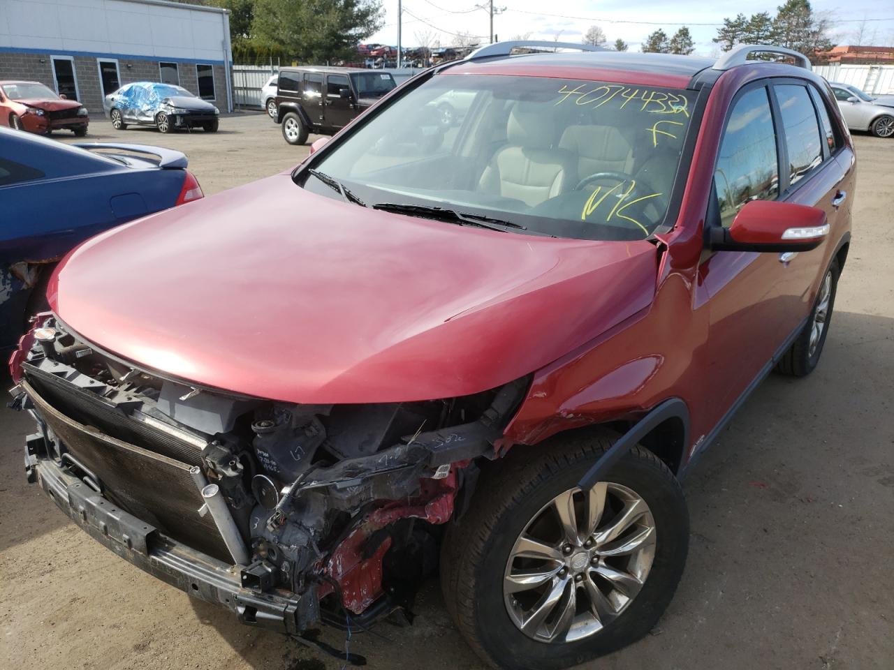 Photo 2 from auction – 2011 KIA SORENTO EX with VIN 5XYKUDA26BG085413