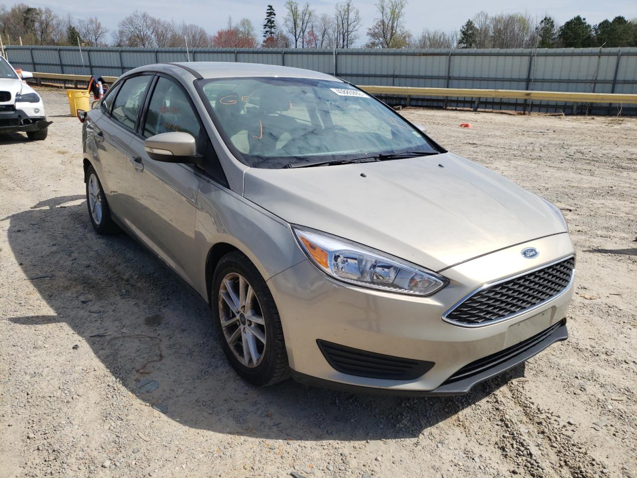 FORD FOCUS SE 2016 with VIN 1FADP3F27GL228325 - Photo from auction