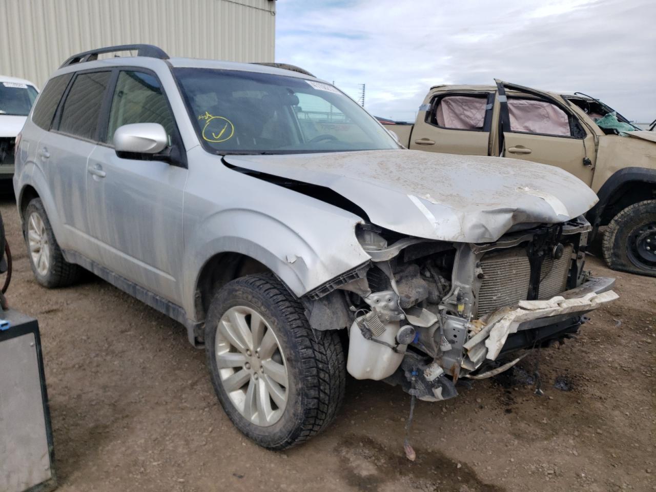 SUBARU FORESTER 2011 with VIN JF2SHCEC9BH761377 - Photo from auction