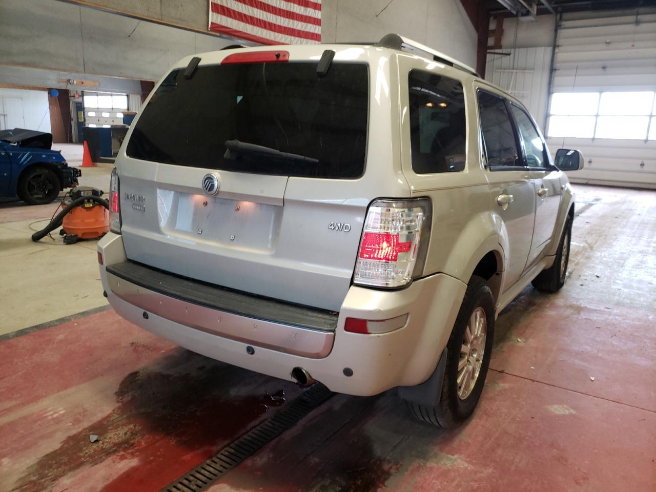 Photo 4 from auction – 2009 MERCURY MARINER PR with VIN 4M2CU97799KJ12395
