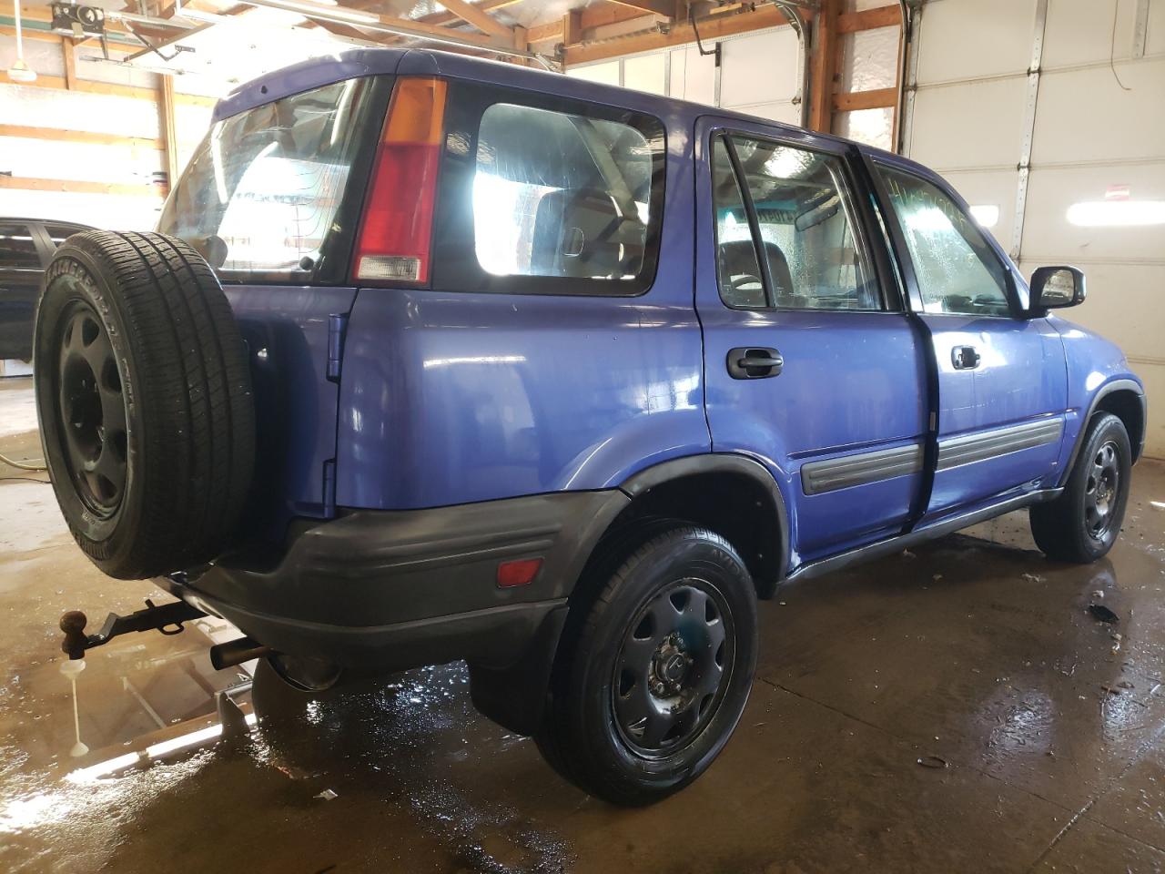 Photo 4 from auction – 2001 HONDA CR-V LX with VIN JHLRD18491C053047