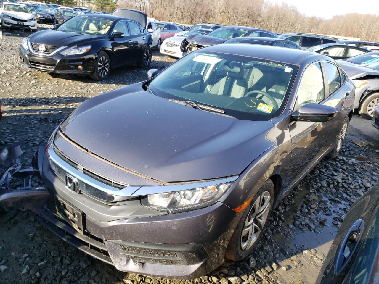 Photo 2 from auction – 2016 HONDA CIVIC LX with VIN 2HGFC2F55GH555033