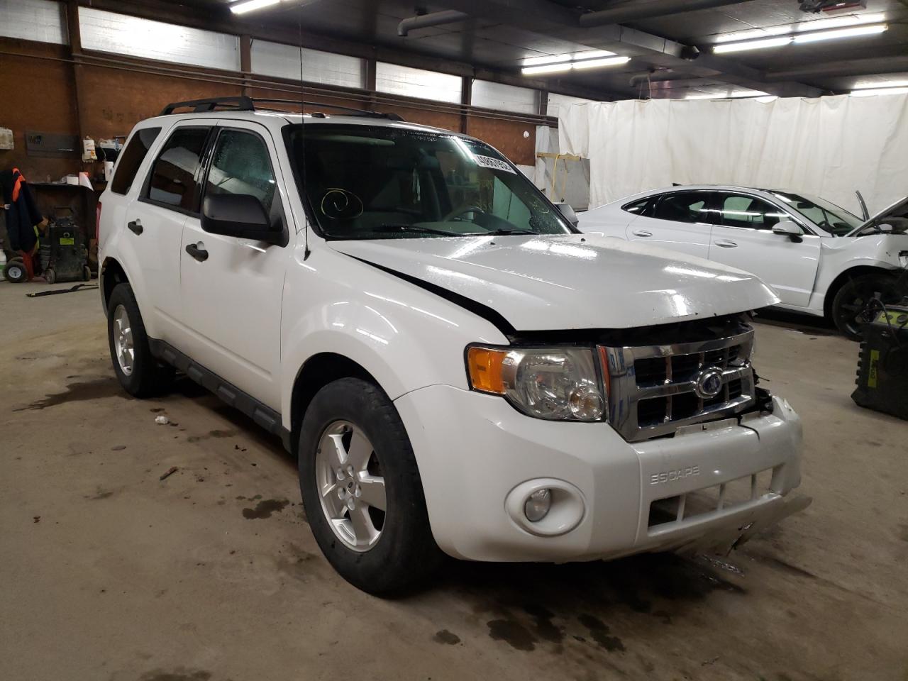 FORD ESCAPE XLT 2011 with VIN 1FMCU0D75BKC30483 - Photo from auction