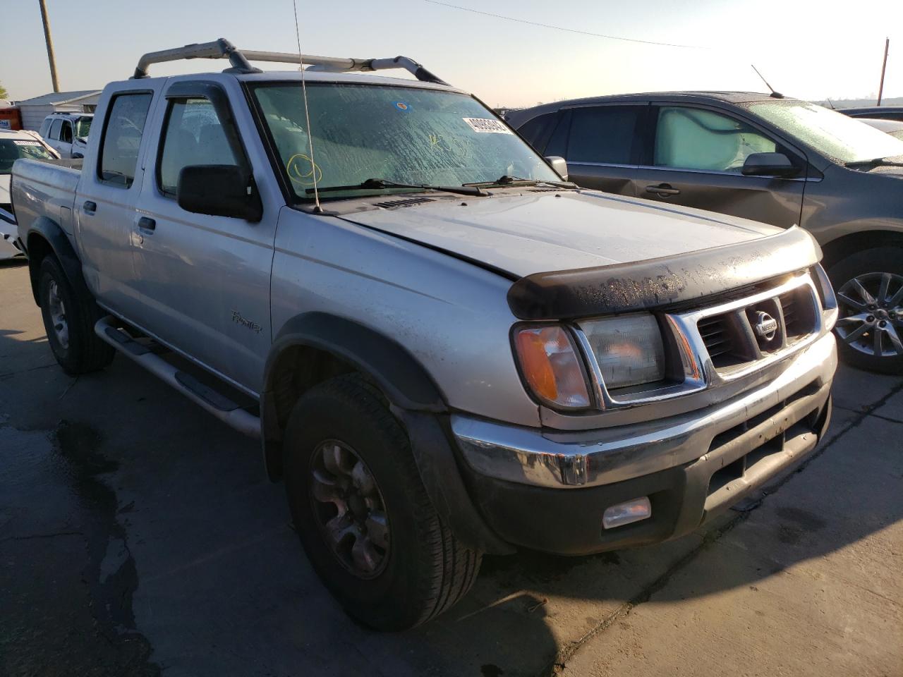 NISSAN FRONTIER C 2000 with VIN 1N6ED27T7YC392858 - Photo from auction