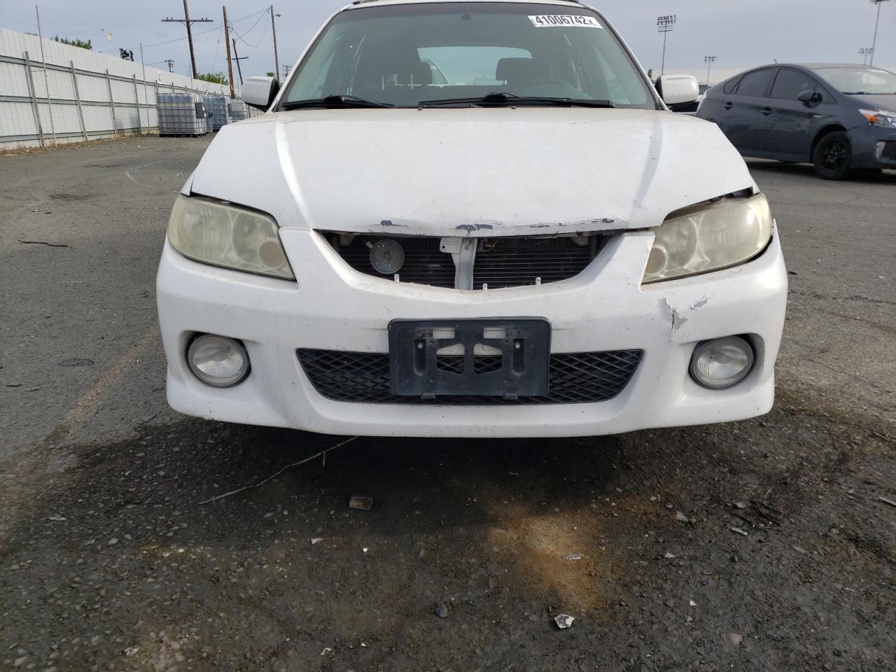 Photo 9 from auction – 2002 MAZDA PROTEGE PR with VIN JM1BJ245021618214