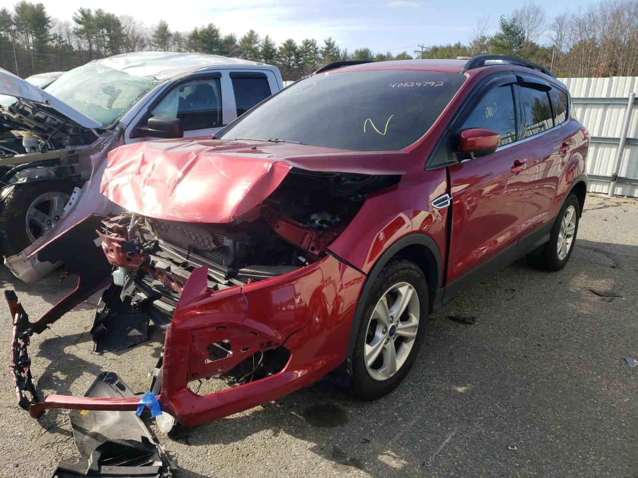 Photo 2 from auction – 2016 FORD ESCAPE SE with VIN 1FMCU9GX5GUB27575