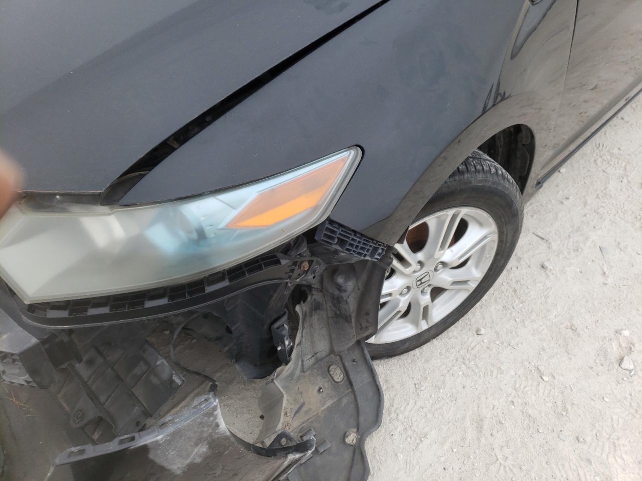 Photo 10 from auction – 2010 HONDA INSIGHT EX with VIN JHMZE2H7XAS035977