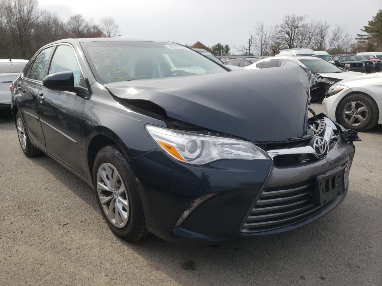 TOYOTA CAMRY LE 2016 with VIN 4T4BF1FK2GR566610 - Photo from auction