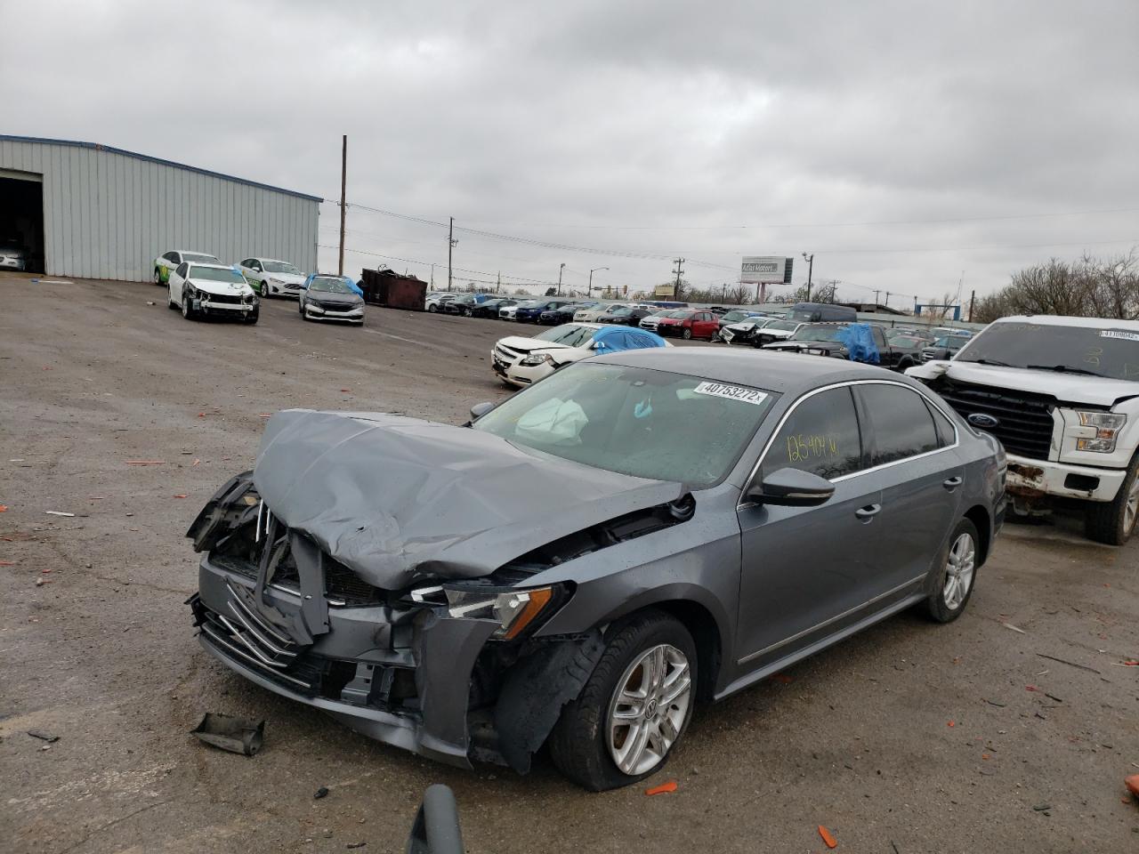 Photo 2 from auction – 2016 VOLKSWAGEN PASSAT S with VIN 1VWAT7A32GC033567