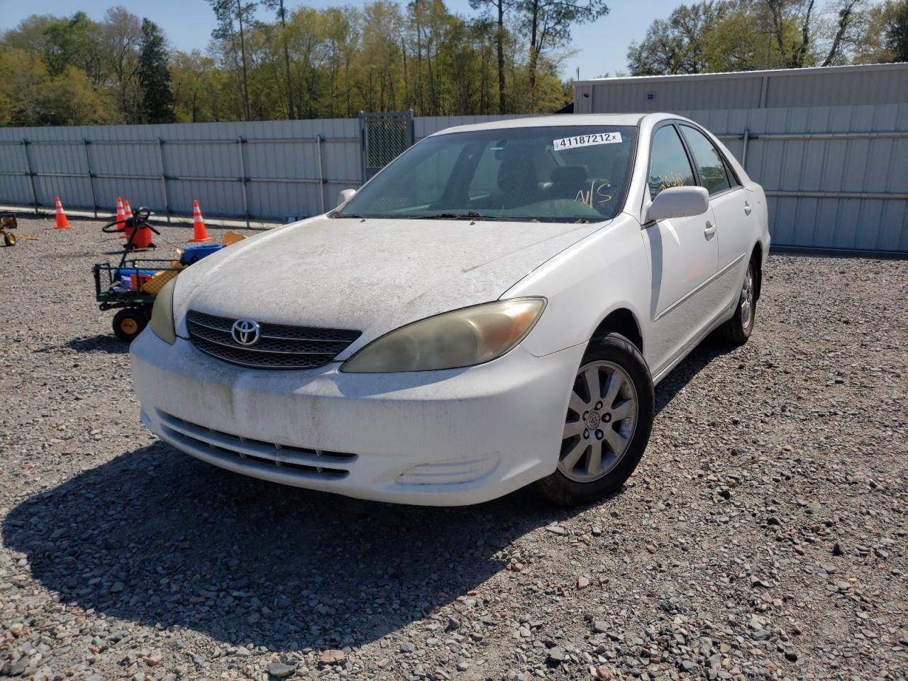 Photo 2 from auction – 2002 TOYOTA CAMRY LE with VIN JTDBF32K920075208