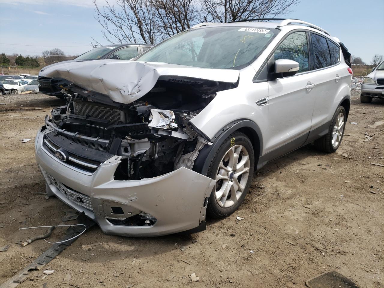 Photo 2 from auction – 2016 FORD ESCAPE TIT with VIN 1FMCU9JXXGUB85531