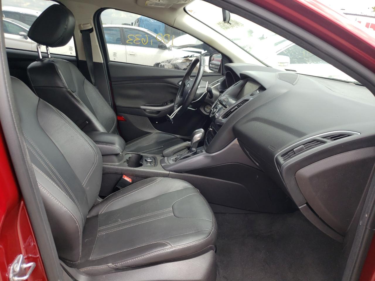 Photo 5 from auction – 2014 FORD FOCUS TITA with VIN 1FADP3J23EL274948