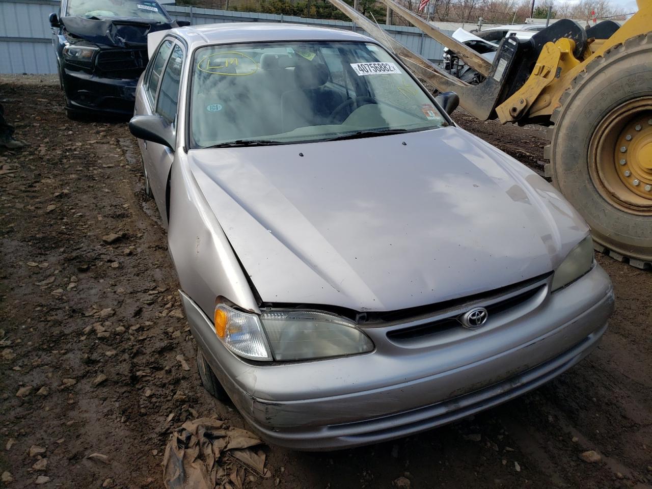 TOYOTA COROLLA VE 1999 with VIN 2T1BR12E2XC166243 - Photo from auction