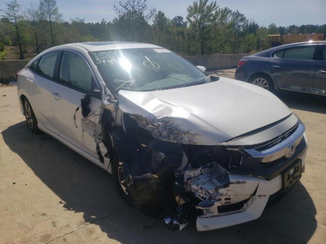HONDA CIVIC EX 2018 with VIN JHMFC1F83JX024045 - Photo from auction