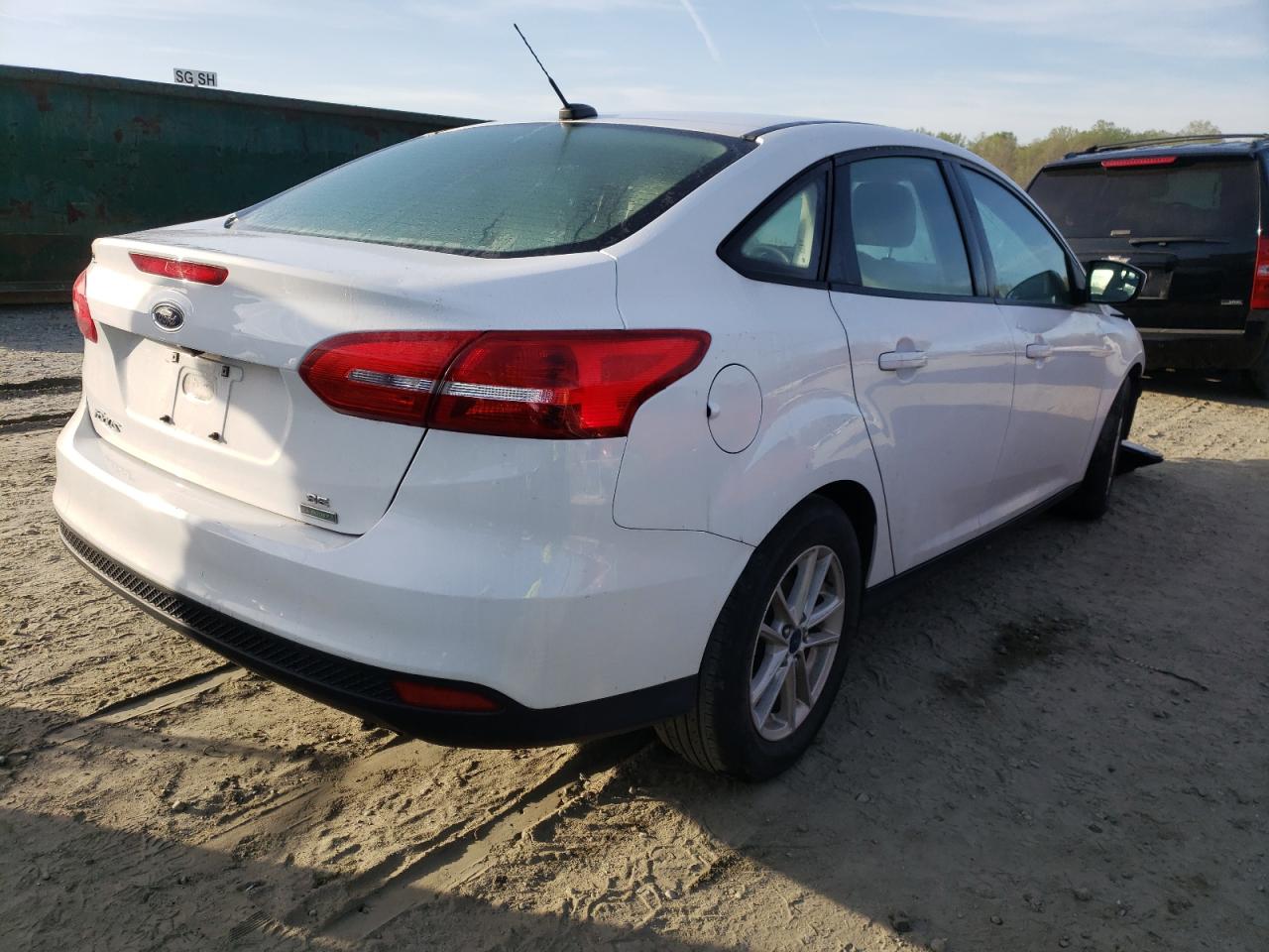 Photo 4 from auction – 2018 FORD FOCUS SE with VIN 1FADP3FE9JL226688