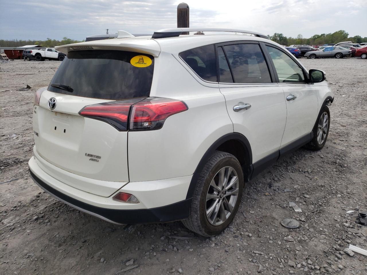 Photo 4 from auction – 2018 TOYOTA RAV4 LIMIT with VIN JTMDFREV8JD237435