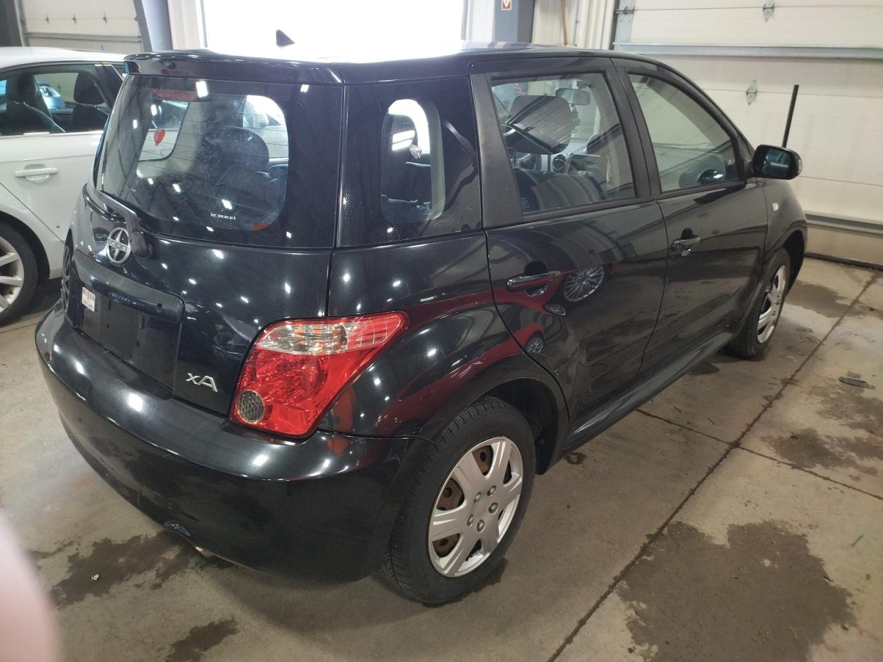 Photo 4 from auction – 2006 TOYOTA SCION XA with VIN JTKKT624360165366