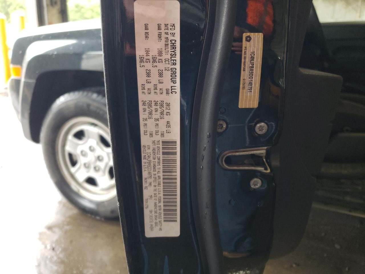 Photo 10 from auction – 2013 JEEP PATRIOT SP with VIN 1C4NJPBA9DD140791