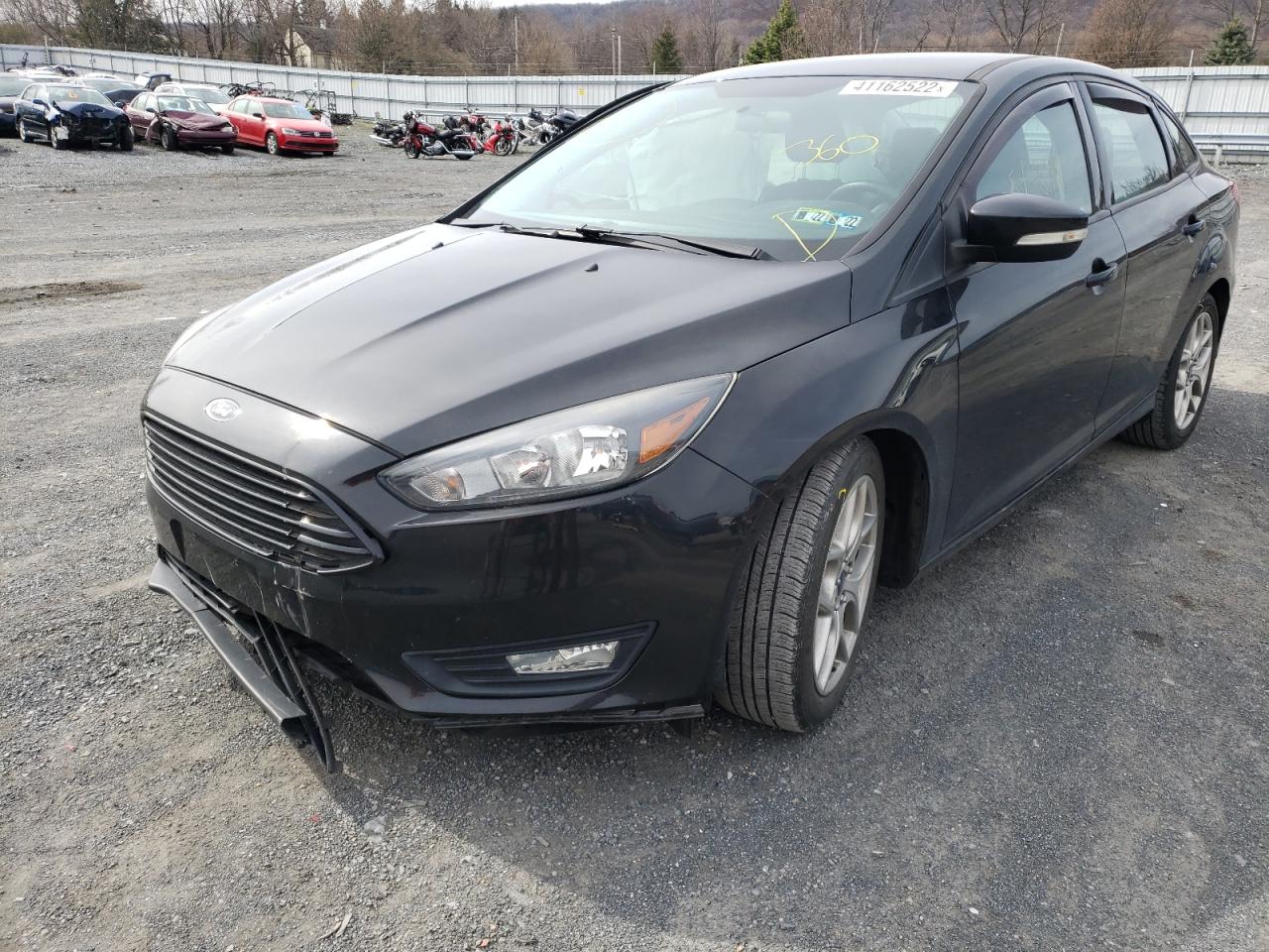 Photo 2 from auction – 2015 FORD FOCUS SE with VIN 1FADP3F21FL291287