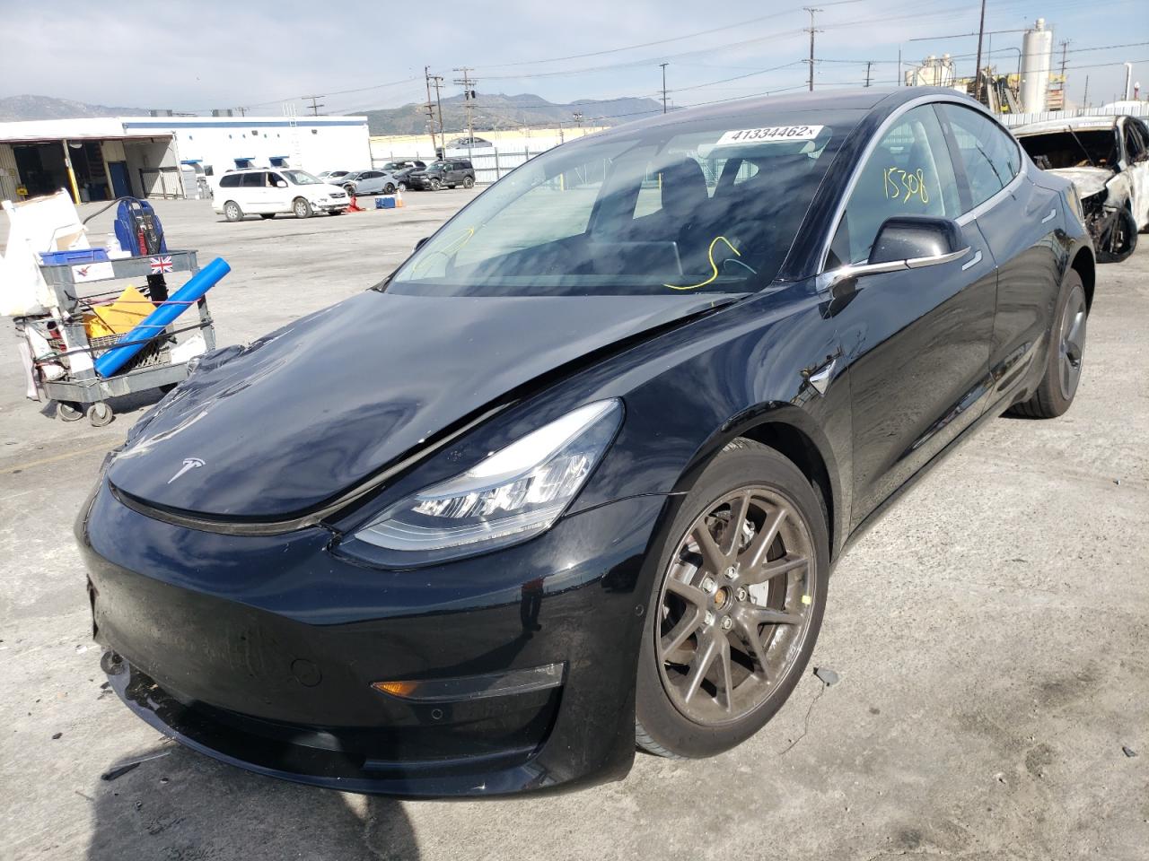 Photo 2 from auction – 2018 TESLA MODEL 3 with VIN 5YJ3E1EB4JF073311