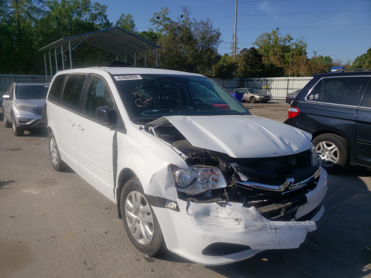DODGE GRAND CARA 2016 with VIN 2C4RDGBG4GR183952 - Photo from auction