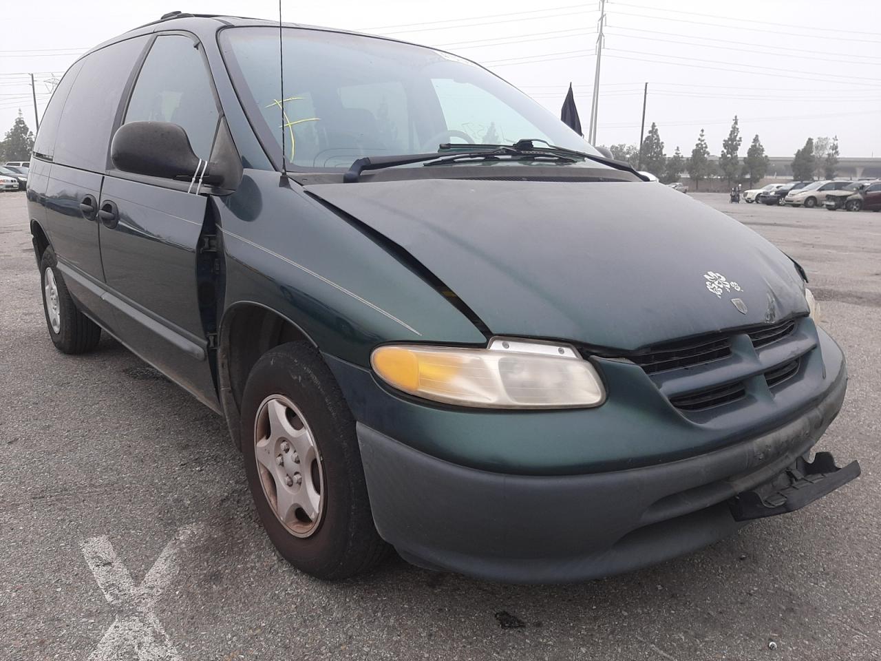 DODGE CARAVAN 1998 with VIN 2B4GP25RXWR656988 - Photo from auction