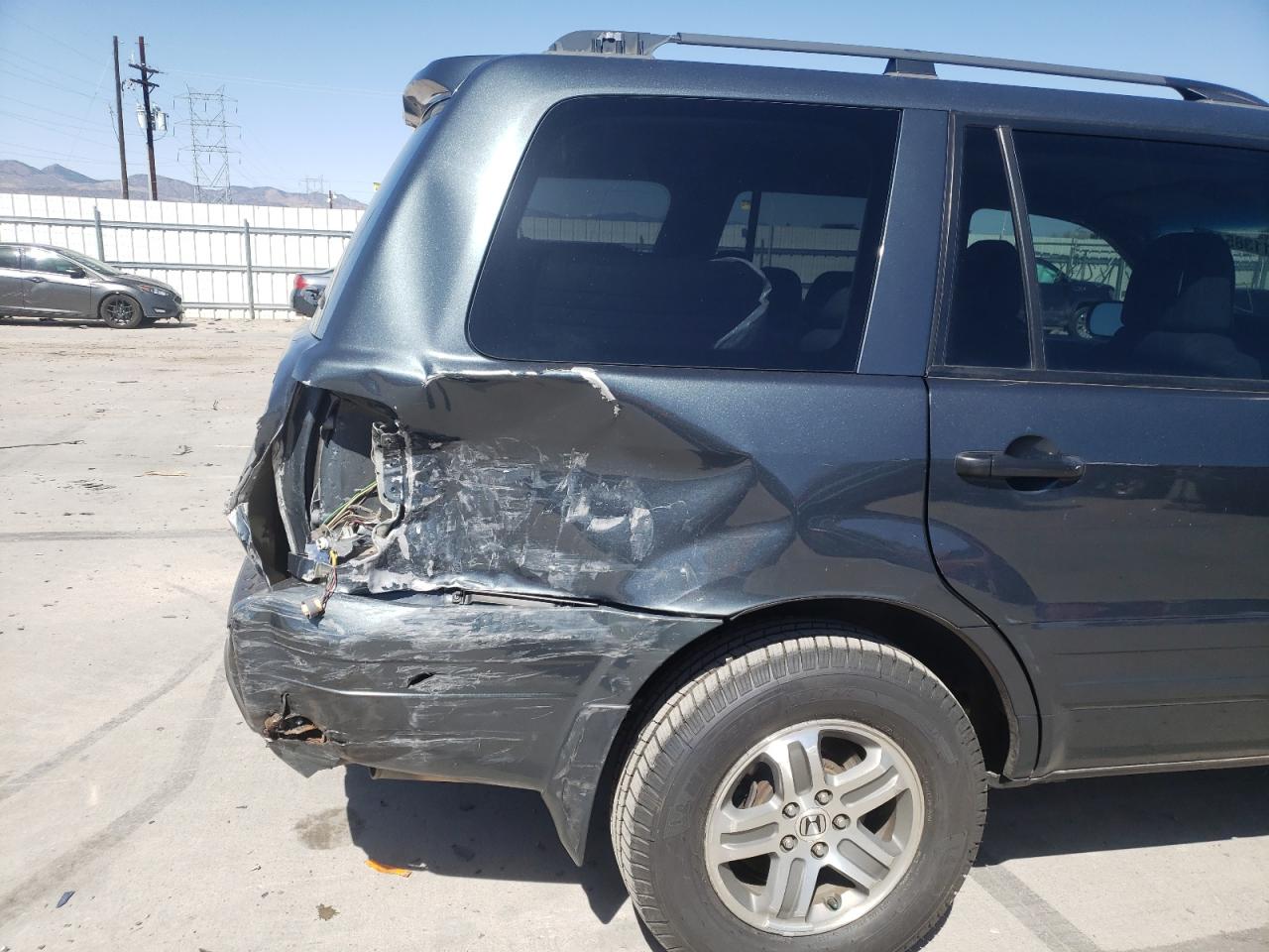 Photo 9 from auction – 2004 HONDA PILOT EXL with VIN 2HKYF187X4H517954