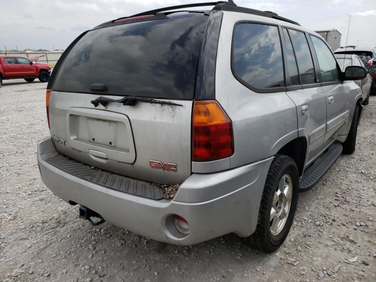 Photo 4 from auction – 2004 GMC ENVOY with VIN 1GKDS13S742135926