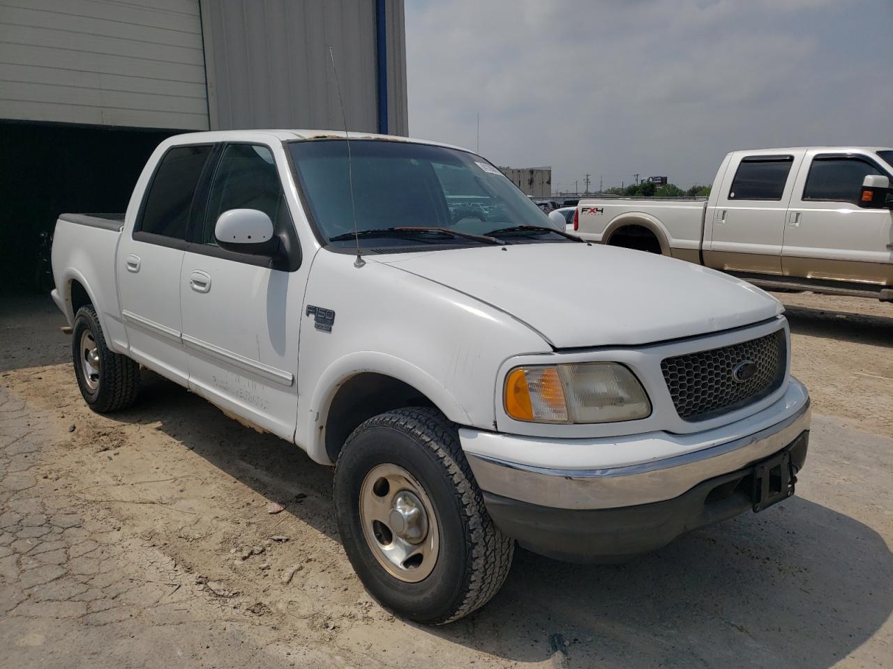 FORD F150 SUPER 2002 with VIN 1FTRW086X2KC75249 - Photo from auction
