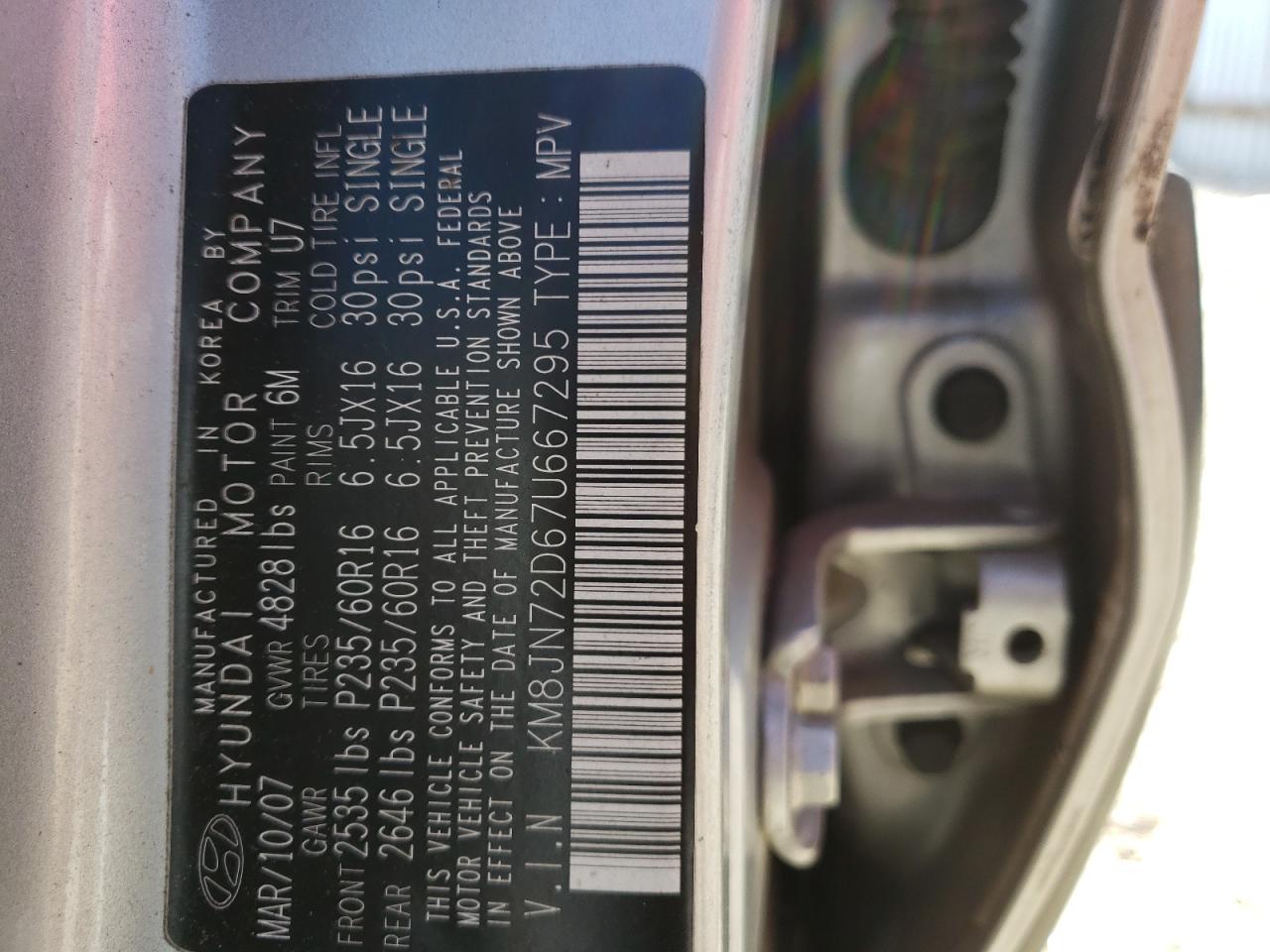 Photo 10 from auction – 2007 HYUNDAI TUCSON SE with VIN KM8JN72D67U667295