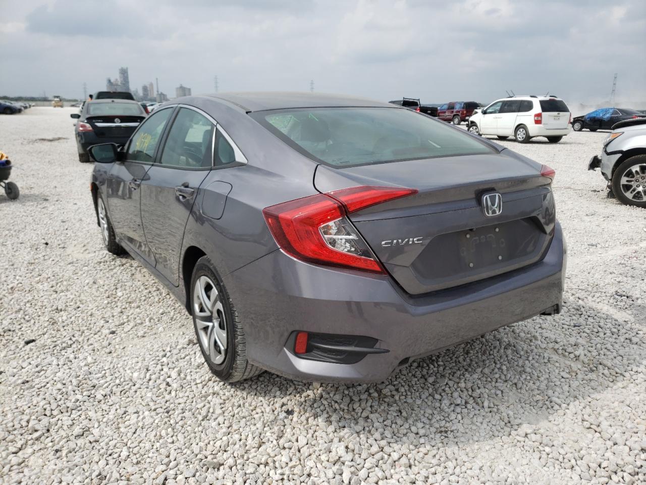 Photo 3 from auction – 2016 HONDA CIVIC LX with VIN 19XFC2F54GE007292