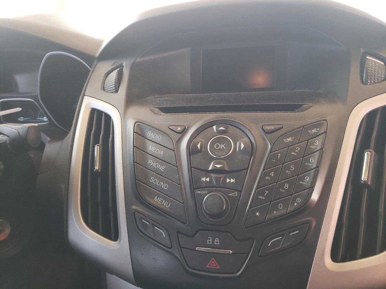 Photo 9 from auction – 2014 FORD FOCUS SE with VIN 1FADP3F28EL291625