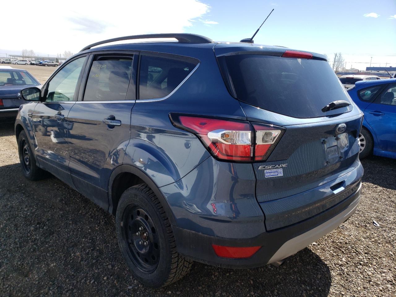 Photo 3 from auction – 2018 FORD ESCAPE SE with VIN 1FMCU9GDXJUC52262