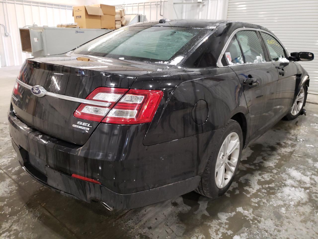 Photo 4 from auction – 2015 FORD TAURUS SEL with VIN 1FAHP2E8XFG114229