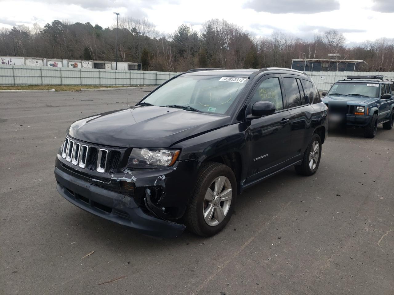 Photo 2 from auction – 2014 JEEP COMPASS LA with VIN 1C4NJDEB2ED769281
