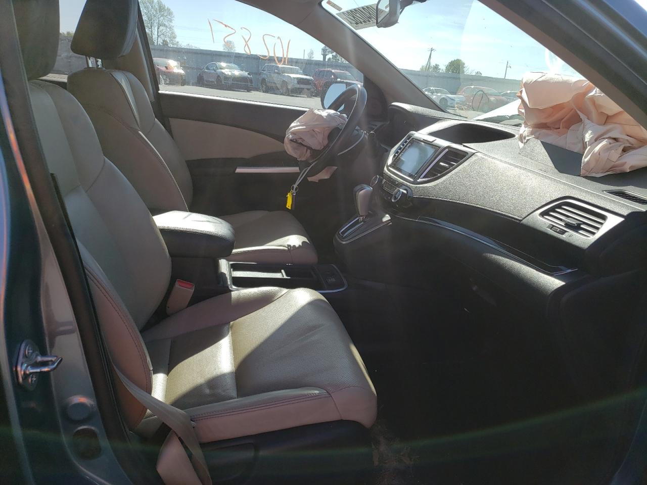 Photo 5 from auction – 2016 HONDA CR-V EXL with VIN 2HKRM3H79GH505370