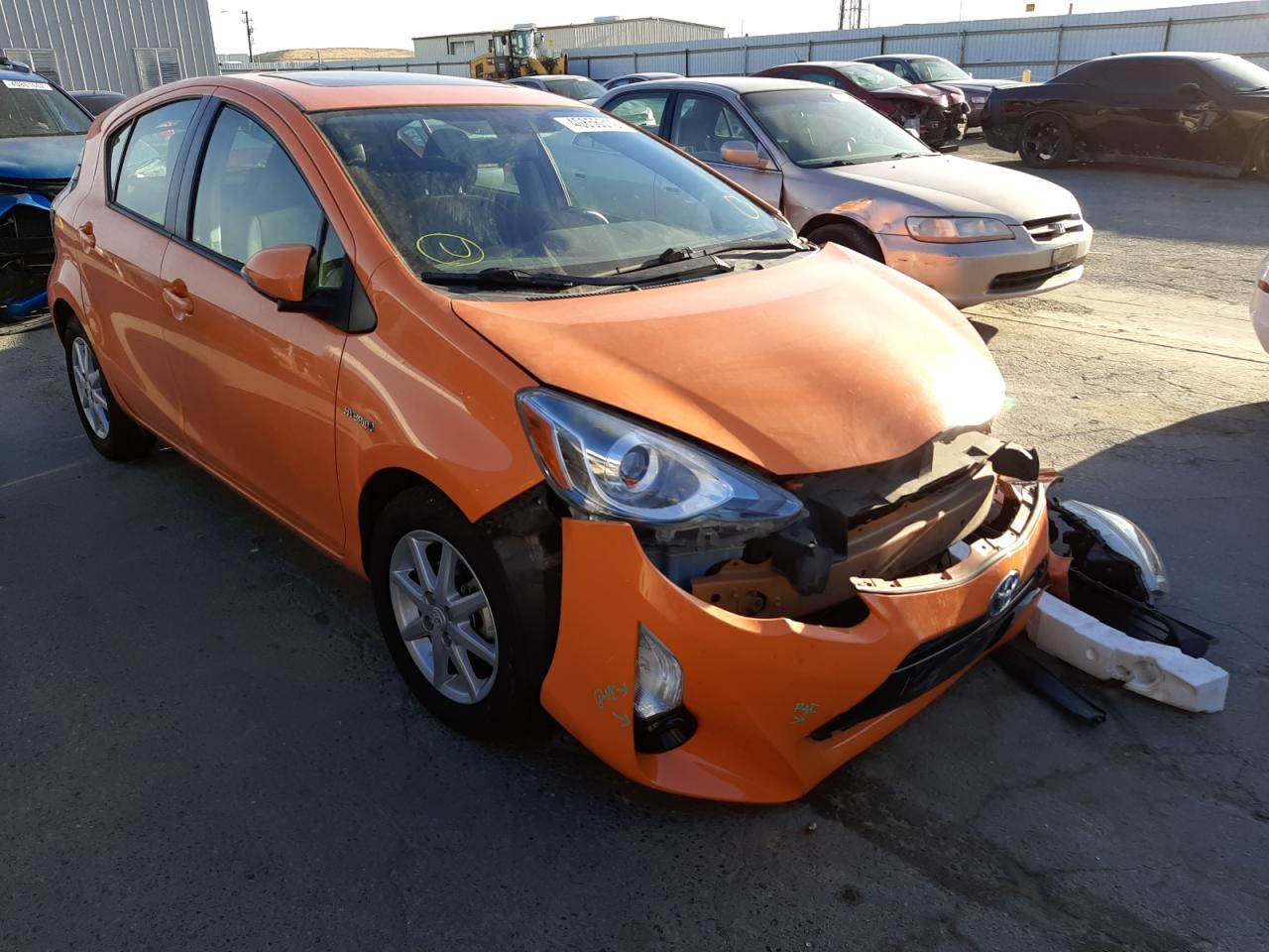 TOYOTA PRIUS C 2015 with VIN JTDKDTB34F1096823 - Photo from auction