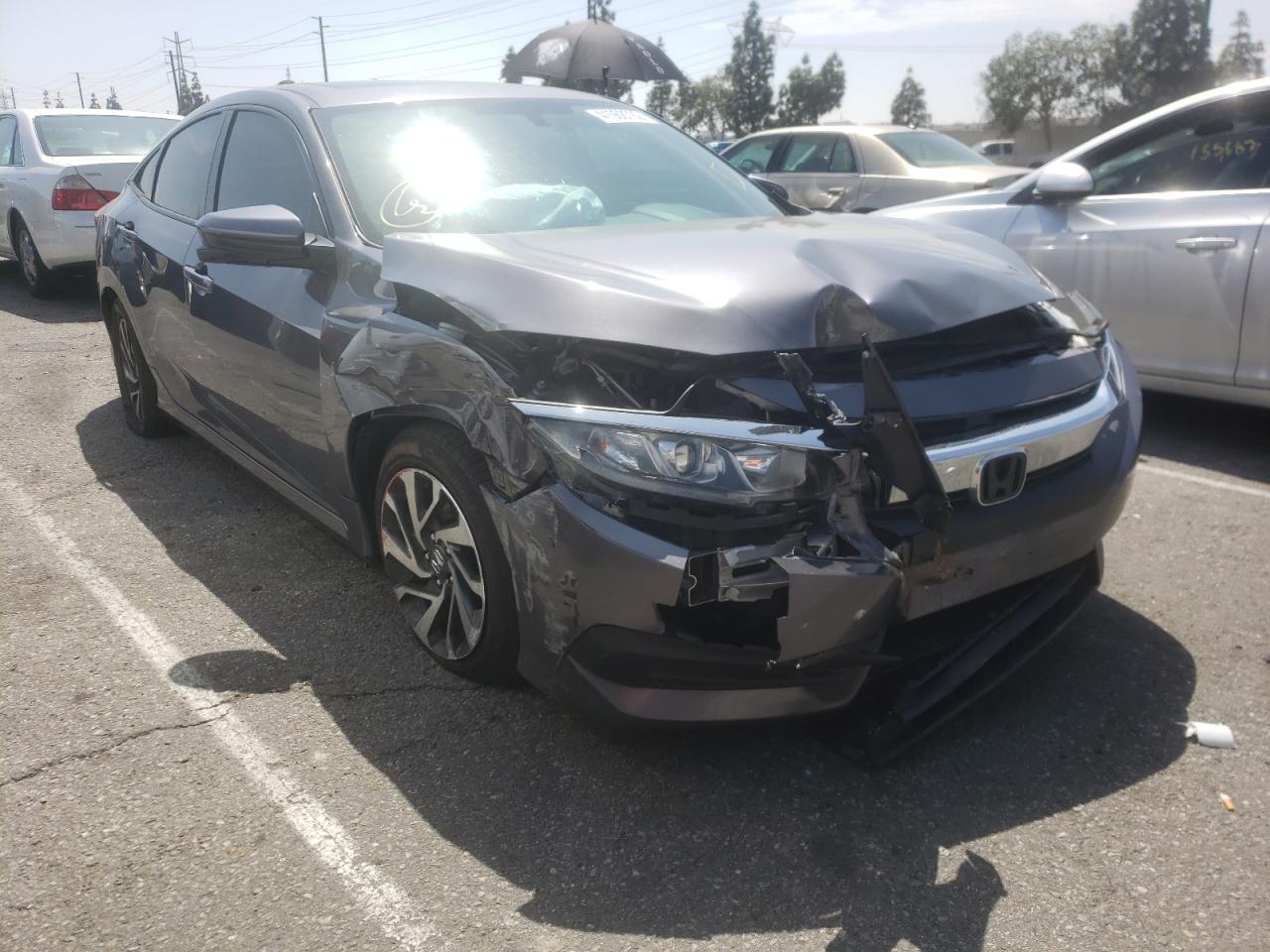 HONDA CIVIC EX 2017 with VIN 19XFC2F74HE222139 - Photo from auction