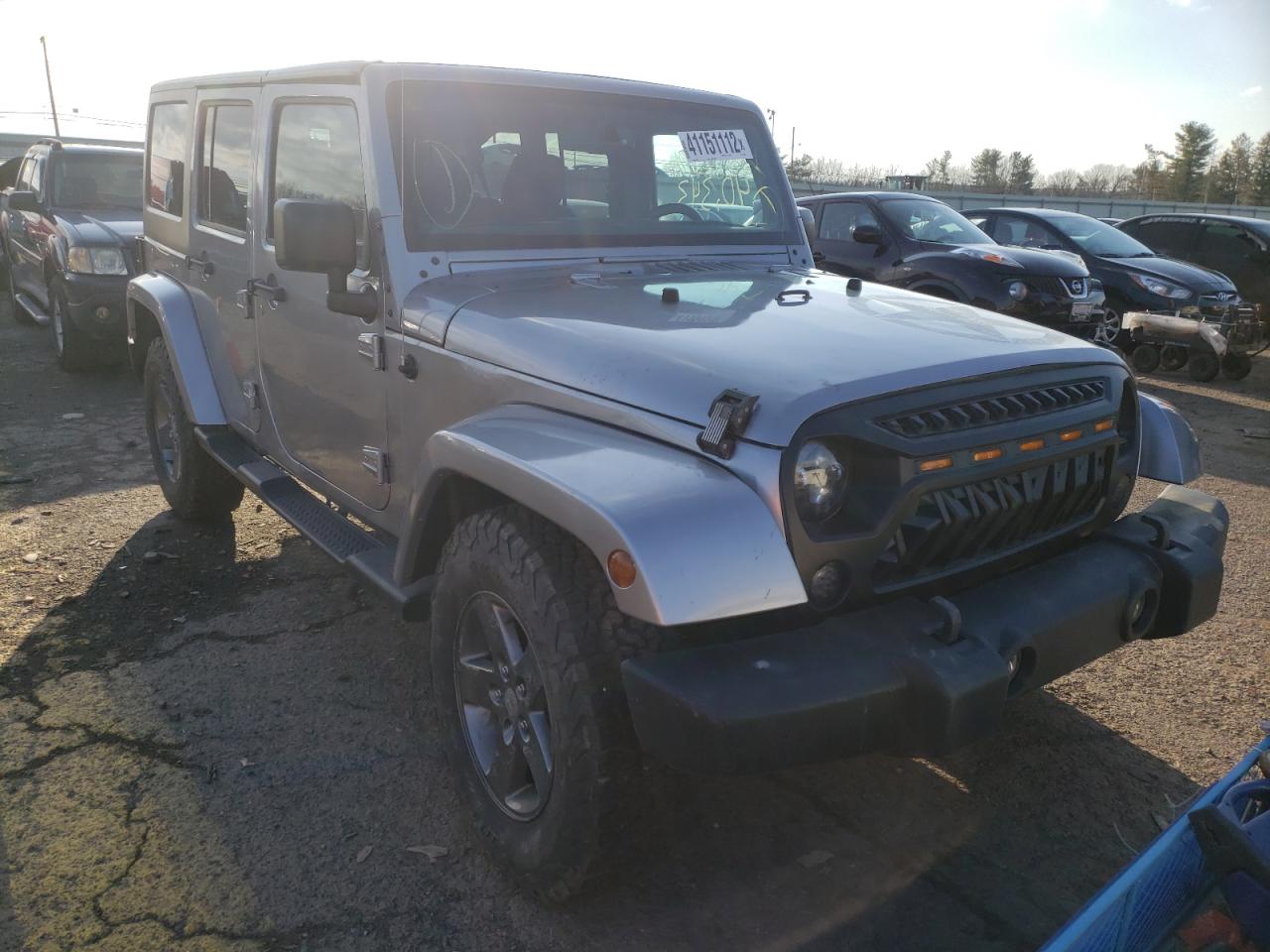 JEEP WRANGLER U 2015 with VIN 1C4BJWDG9FL573289 - Photo from auction