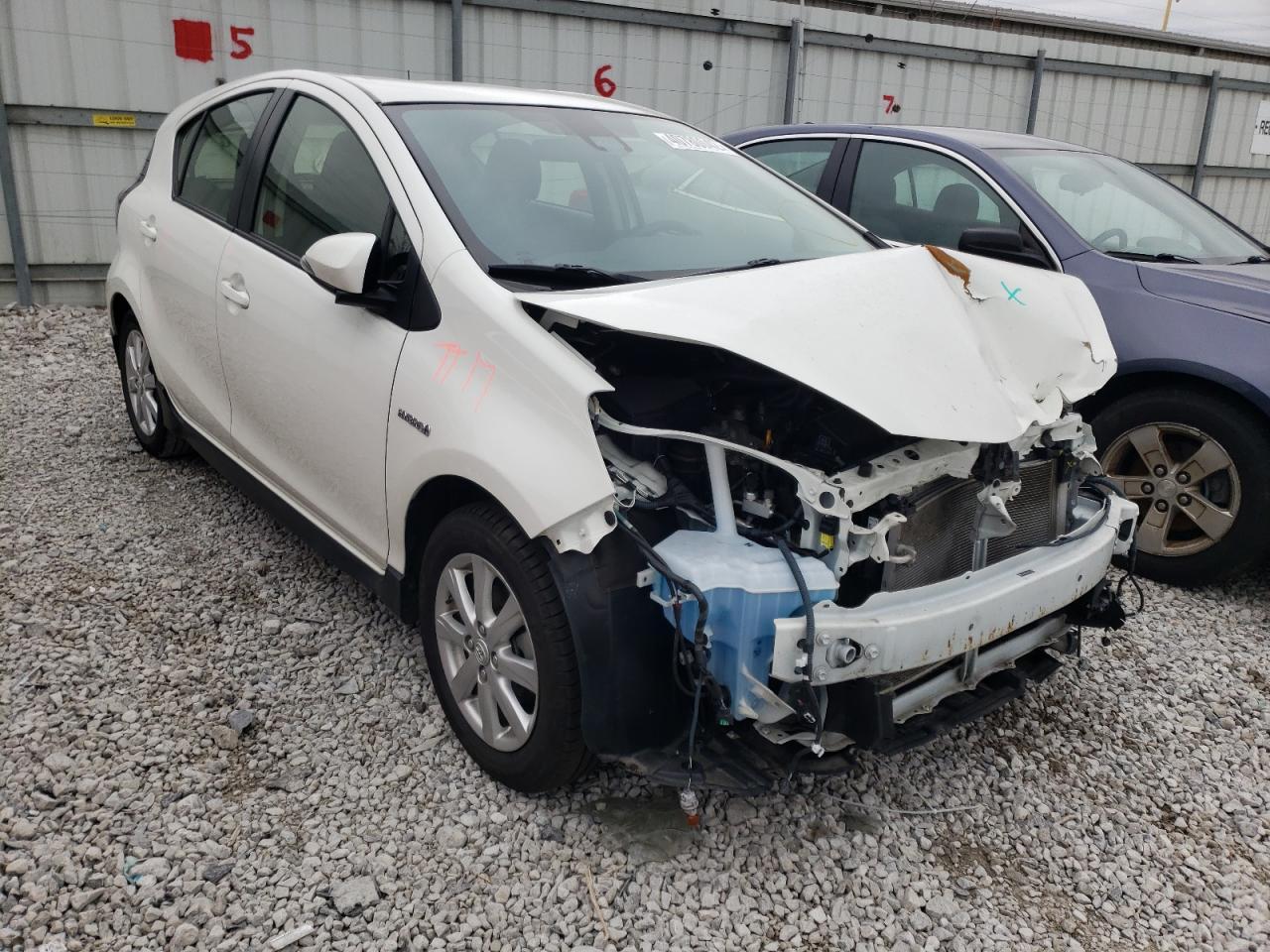 TOYOTA PRIUS C 2017 with VIN JTDKDTB38H1591173 - Photo from auction