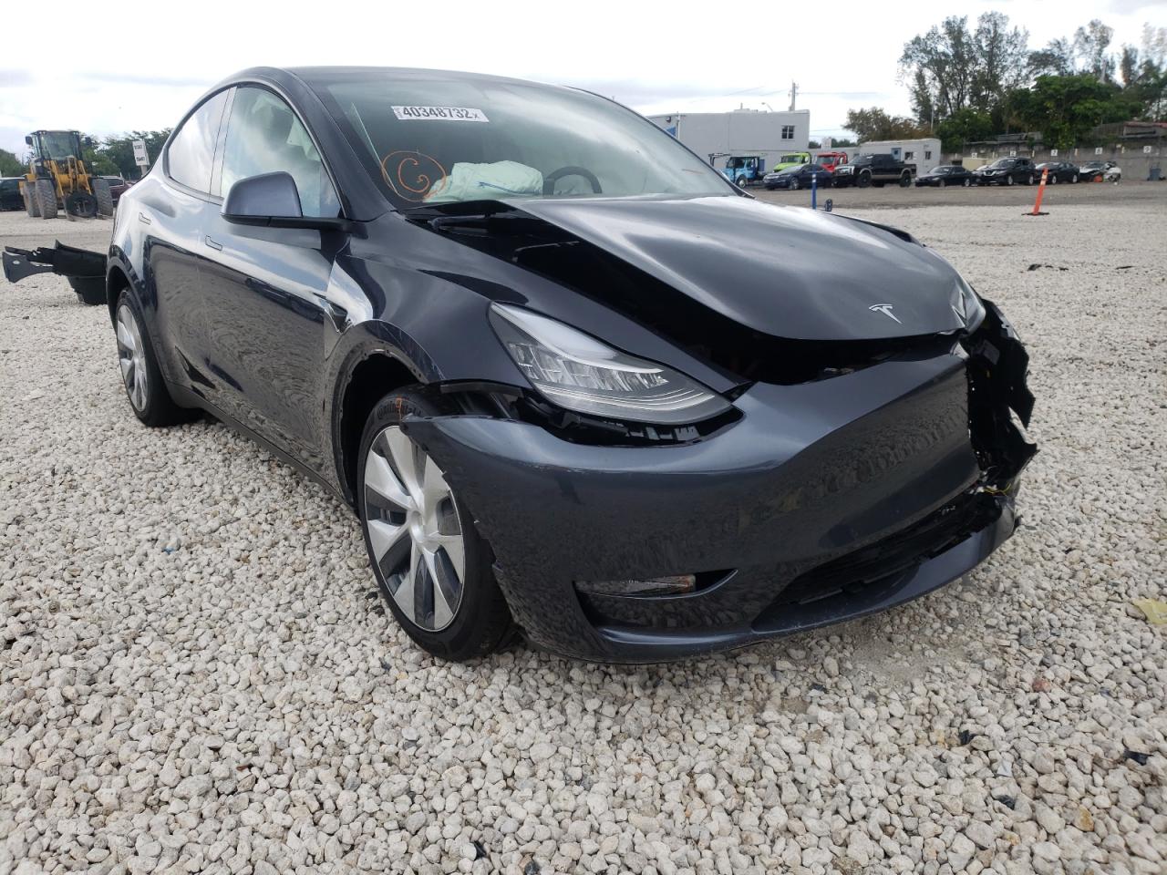 TESLA MODEL Y 2022 with VIN 7SAYGDEE0NF379006 - Photo from auction