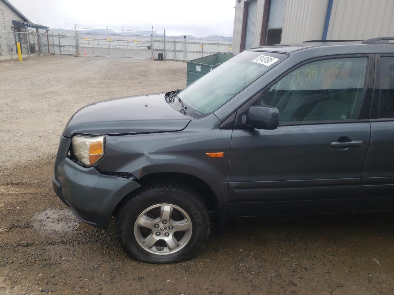 Photo 9 from auction – 2006 HONDA PILOT EX with VIN 2HKYF18456H533083
