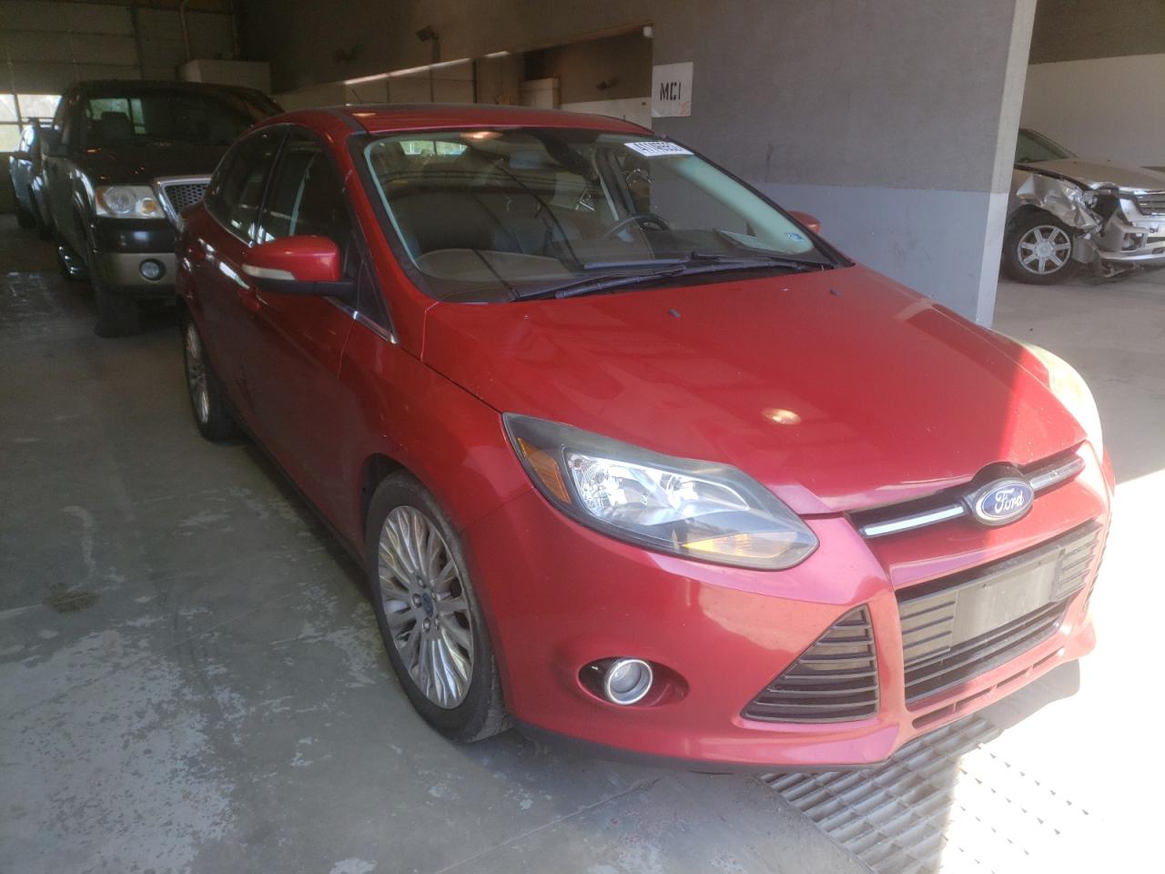 FORD FOCUS TITA 2012 with VIN 1FAHP3J27CL327360 - Photo from auction
